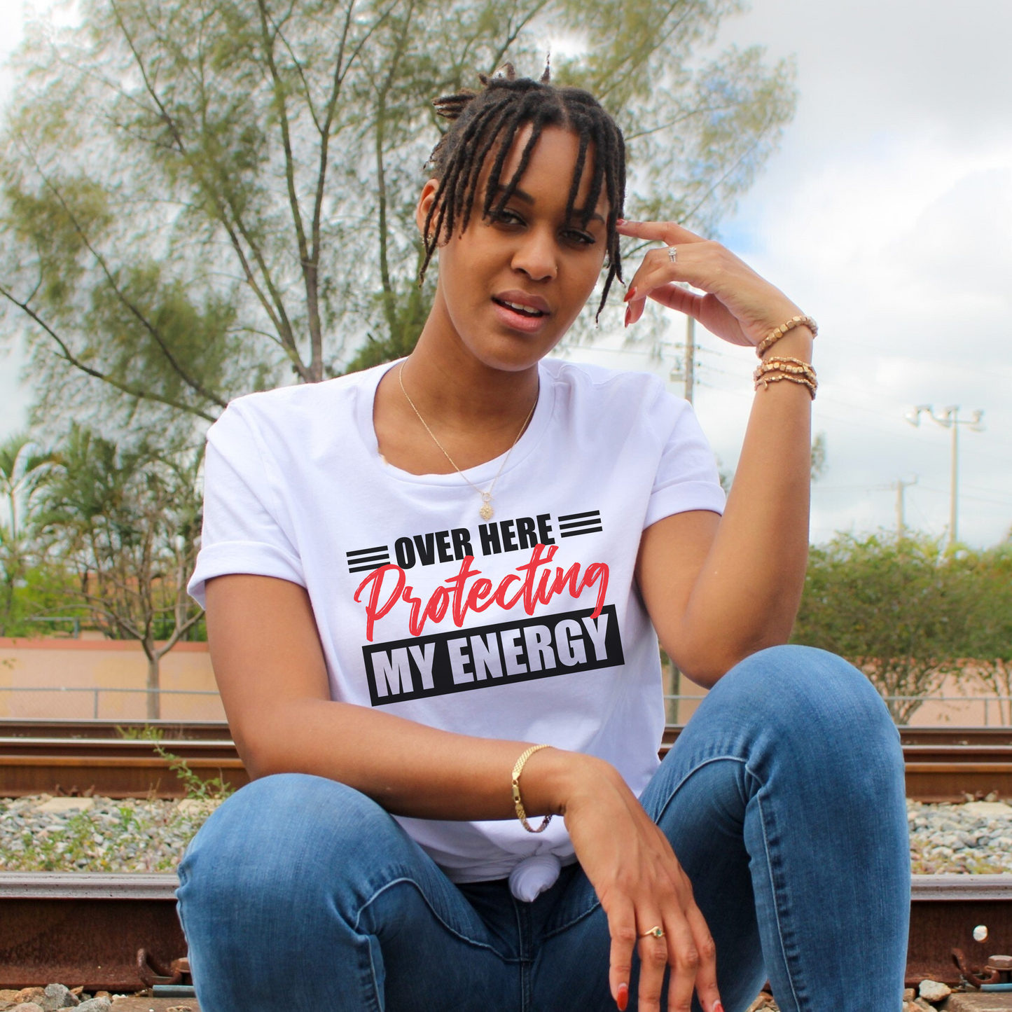 Over here protecting my energy t-shirt